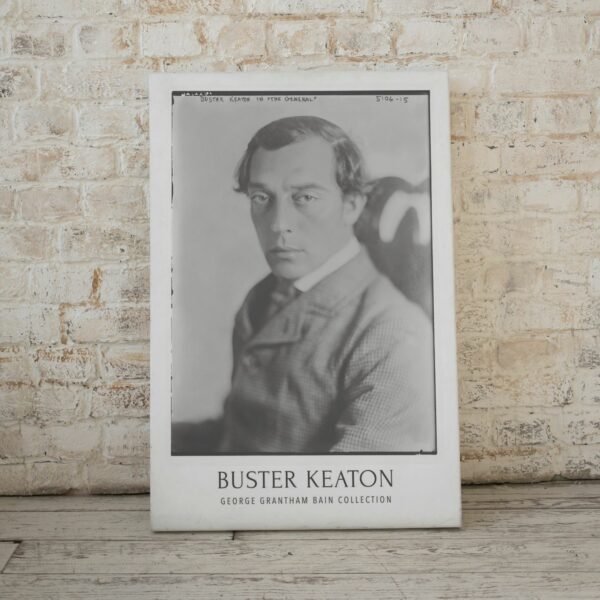 Buster Keaton Silent Film Era Poster: A tribute to the comedic genius and pioneering filmmaker, ideal for cinema enthusiasts and as a classic decorative piece in any setting.