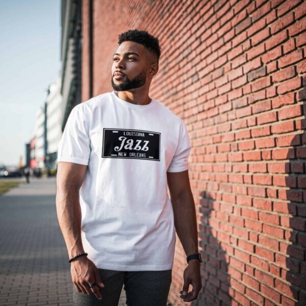 Crisp t-shirt featuring a classic 'Louisiana Jazz - New Orleans' license plate design, perfect for jazz enthusiasts and souvenir collectors.