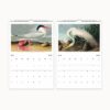 2024 John James Audubon wall calendar with a detailed illustration of an American White Pelican