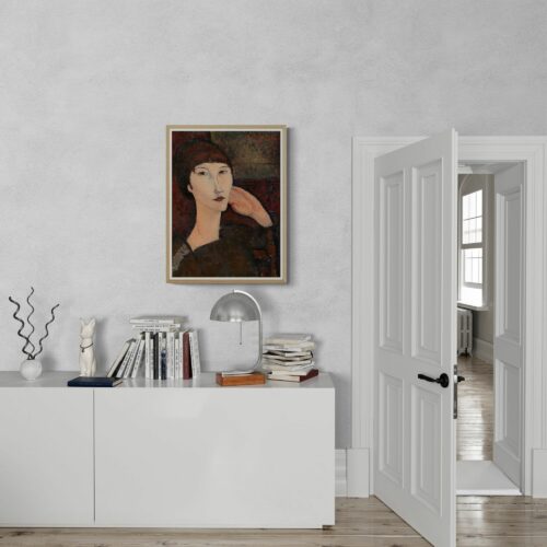 Portrait of Adrienne by Amedeo Modigliani, featuring a poised woman with a characteristic elongated neck and face, and a subdued expression. Her elegant pose, with hand resting gently against her cheek, and the rich, textured background, captures the essence of Modigliani's modernist portraiture.