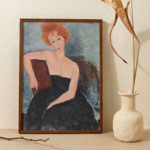 Portrait of a redheaded girl in evening dress by Amedeo Modigliani, depicting a young woman with pale skin and auburn hair styled in loose waves. Her deep, thoughtful gaze and the relaxed pose with one arm resting along the back of a chair showcase Modigliani's distinctive approach to form and emotion. The muted, textured background complements the stark contrast of her dark dress and fair complexion.