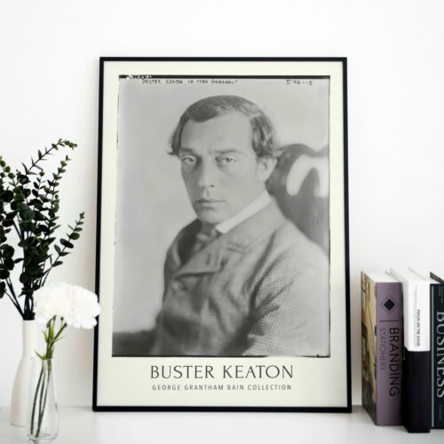 Buster Keaton Silent Film Era Poster: A tribute to the comedic genius and pioneering filmmaker, ideal for cinema enthusiasts and as a classic decorative piece in any setting.