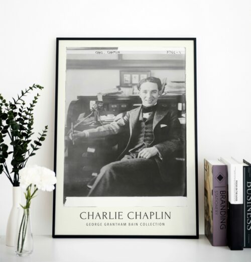 Charlie Chaplin Poster: Iconic Silent Film Era Star. A tribute to Chaplin's groundbreaking work in early Hollywood, perfect for cinema enthusiasts and as a classic decorative piece for any space.