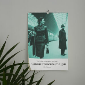 2024 'Elegance Through the Lens' wall calendar, featuring Toni Frissell's pioneering fashion photography, including her famed 1937 photo of Frida Kahlo, ideal for admirers of fashion history and photography.