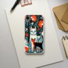 Quirky and colorful phone case featuring playful cats amidst a vibrant floral pattern, perfect for cat lovers looking for a unique and protective accessory for their smartphone