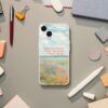 Art-inspired phone case with a floral field painting and Claude Monet quote, perfect for art enthusiasts looking for a blend of classic art and modern smartphone protection
