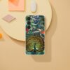 Designer phone case featuring vibrant peacock and tropical birds illustration with lush green foliage and blueberries on a sleek protective cover for smartphones