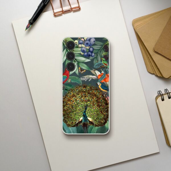 Designer phone case featuring vibrant peacock and tropical birds illustration with lush green foliage and blueberries on a sleek protective cover for smartphones