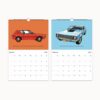 1970s AMC Javelin muscle car featured on American Motors Remembered Wall calendar cover with bold slogan and retro design.