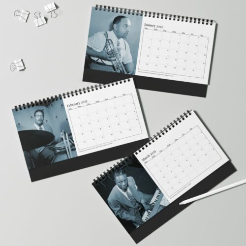 Desk calendar pages spread out, each featuring a black-and-white photo of legendary jazz artists in performance, capturing the essence of the Golden Age of Jazz against monthly calendar grids.