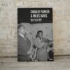 Vintage poster of jazz legends Charlie Parker playing the saxophone and Miles Davis with a trumpet, live in New York 1947, encapsulating the golden era of jazz.