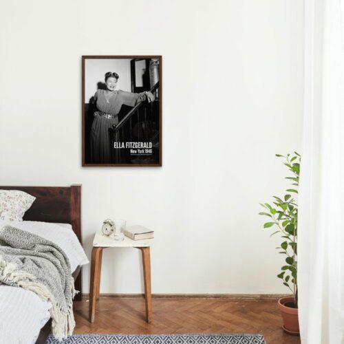 Ella Fitzgerald leaning on railing, New York 1945, in framed poster on wall, evoking vintage charm in a modern space.