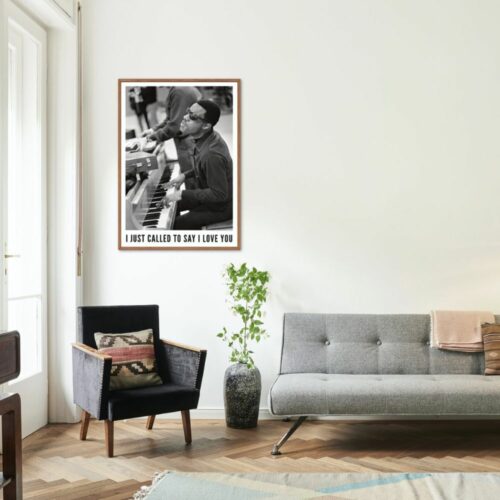Black and white poster of Stevie Wonder playing the piano, wearing sunglasses, retro musical wall decor.