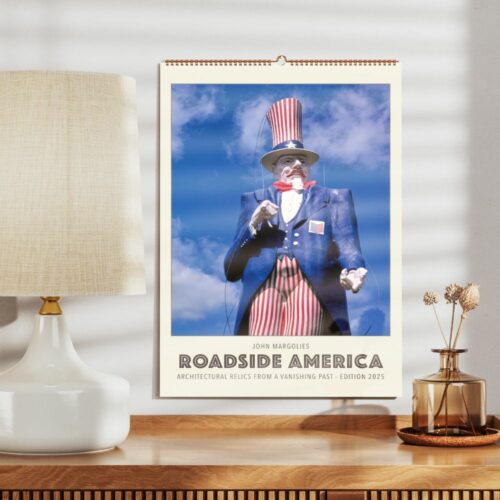 John Margolies Roadside America wall calendar featuring a towering Uncle Sam statue against a blue sky