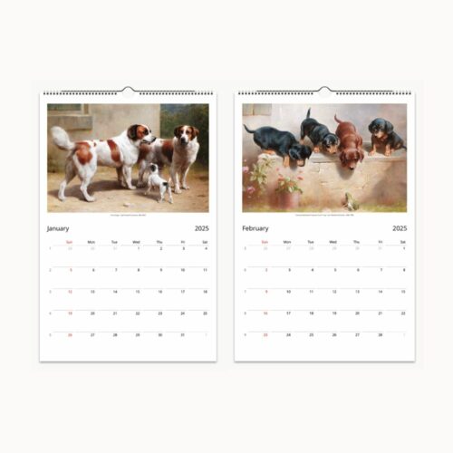 Open wall calendar showing January and February months of 2025 with paintings of playful dogs and puppies by Carl Reichert, each month laid out with a simple grid for dates.