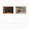 September and October pages from 2025 Carl Reichert dog-themed wall calendar, featuring realistic dog portraits with ample writing space in the date grid.