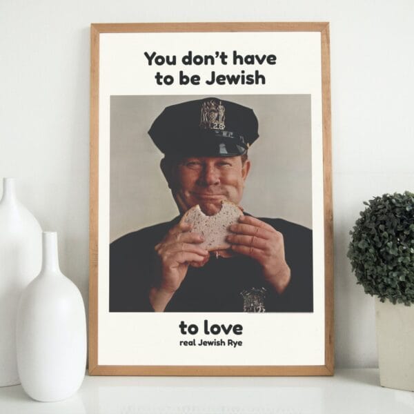 "You Don’t Have to Be Jewish" vintage poster featuring a smiling police officer enjoying rye bread. Iconic 1960s Levy’s Jewish Rye ad campaign with inclusive messaging. Retro typography, cultural impact, and mid-century advertising design.