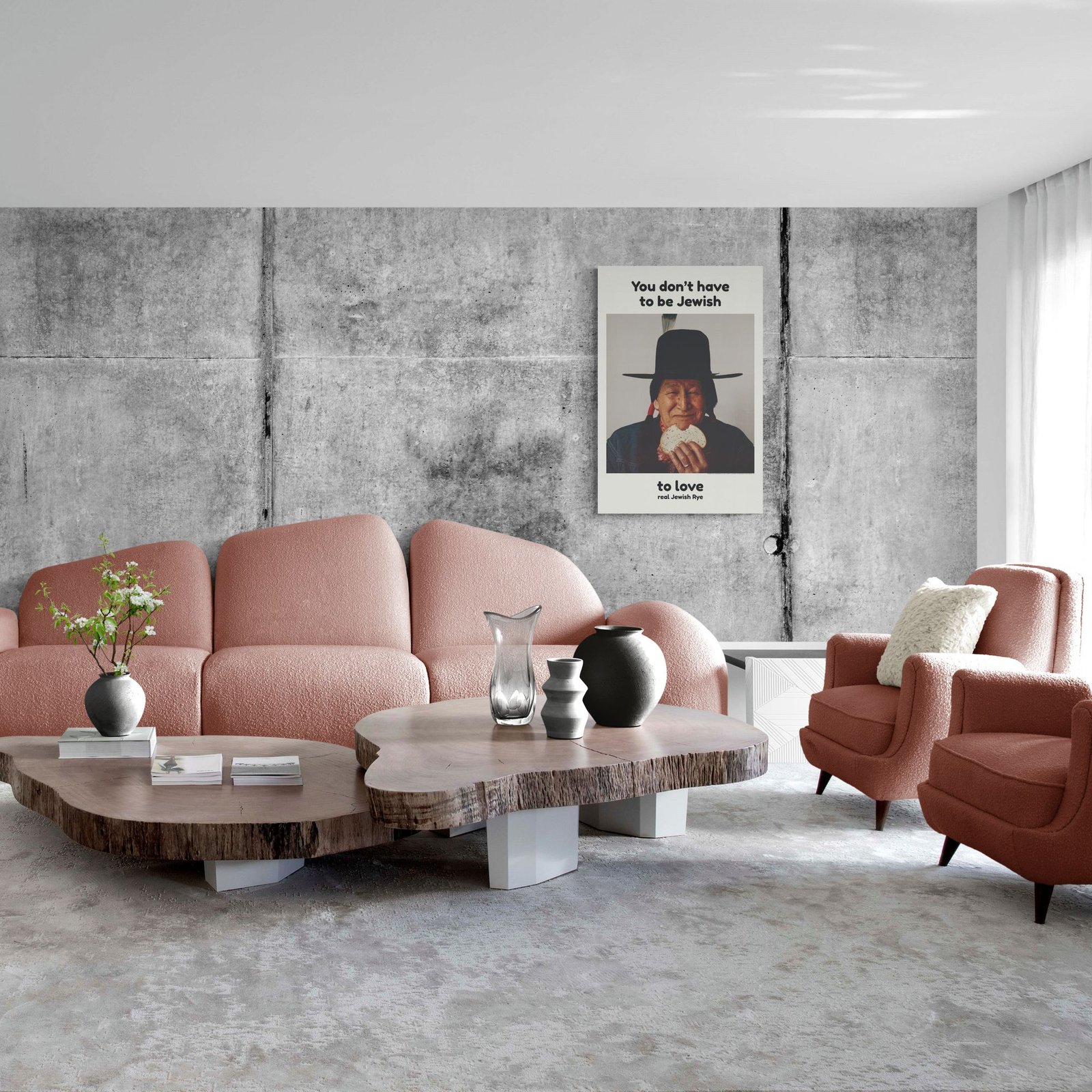 Modern living room with pink furniture and concrete wall.