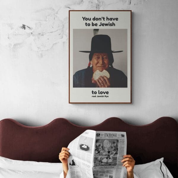 Vintage advertisement poster featuring a smiling Native American man with long braids and a feathered hat, holding a sandwich on Jewish rye bread. A nostalgic piece of 1960s advertising history.