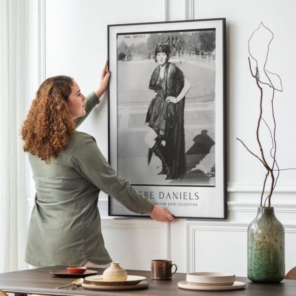 Bebe Daniels vintage movie poster featuring a black and white classic Hollywood photograph from the George Grantham Bain Collection. A must-have for silent film enthusiasts, retro movie lovers, and collectors of old Hollywood decor. Available as a premium art print or foam board for easy wall mounting