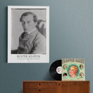 Buster Keaton vintage movie poster featuring a classic black-and-white portrait from the silent film era. Perfect for retro movie decor, classic Hollywood wall art, and film buff collections. A must-have for silent film lovers and vintage cinema enthusiasts.