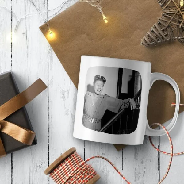 Mug with Ella Fitzgerald photo, wooden background, holiday theme.