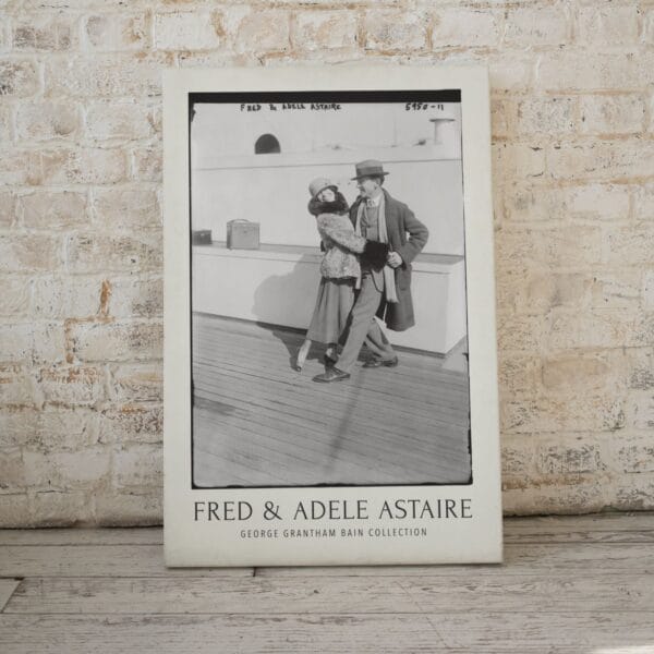 Fred and Adele Astaire vintage black and white print featuring the iconic dance duo on a ship deck, captured in the early 20th century. Classic Hollywood wall art, available as a premium museum-quality print or foam board. Perfect for film history enthusiasts and vintage decor lovers.