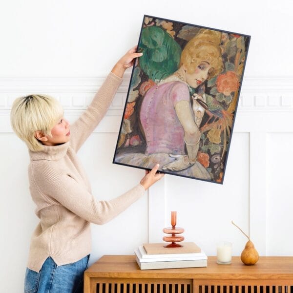 Colorful Gerda Wegener painting of Lili Elbe with a green feather fan, set against a backdrop of vibrant flowers, exemplifying early 20th-century Art Deco style and femininity.