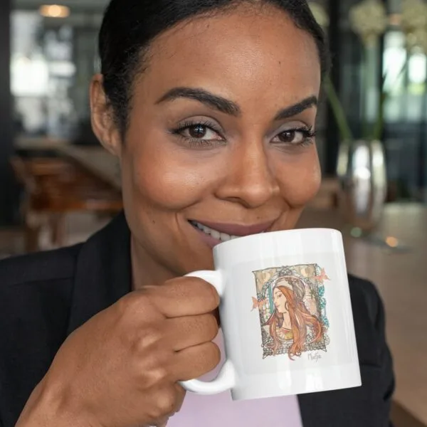 Woman smiling, holding printed coffee mug.