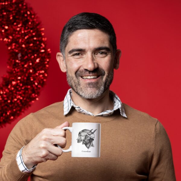 Smiling man holding a mug on red background