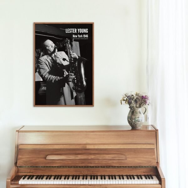 Black and white Lester Young poster above piano.