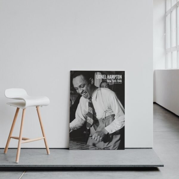 Lionel Hampton poster beside modern white chair.