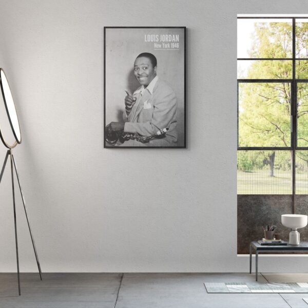 Vintage photo of musician Louis Jordan in room.