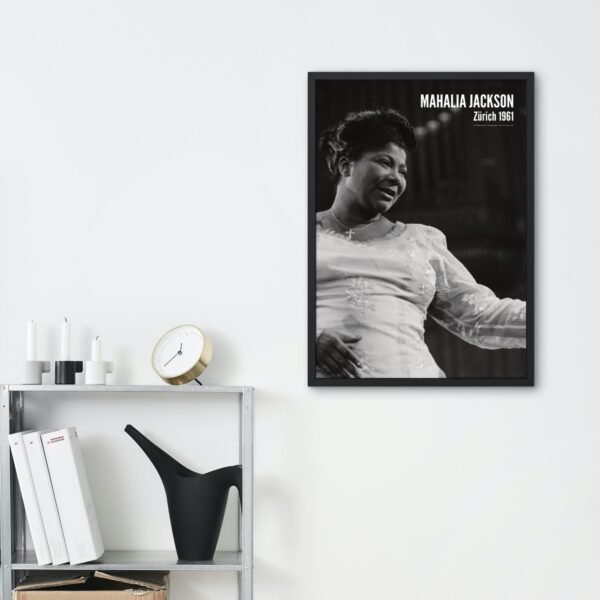 Photo of a framed portrait on a shelf.