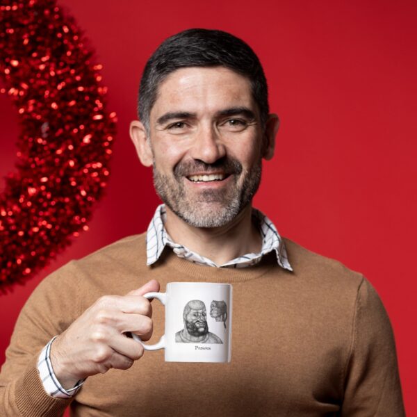 Smiling person holding cup with red background