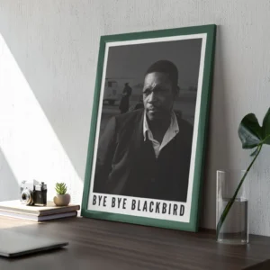 Framed Bye Bye Blackbird poster on desk