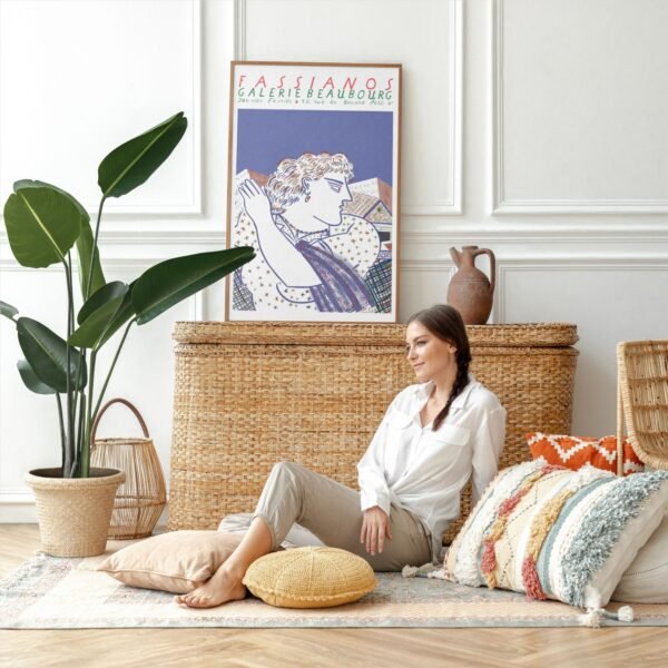 Woman relaxing in cozy, stylish living room space.