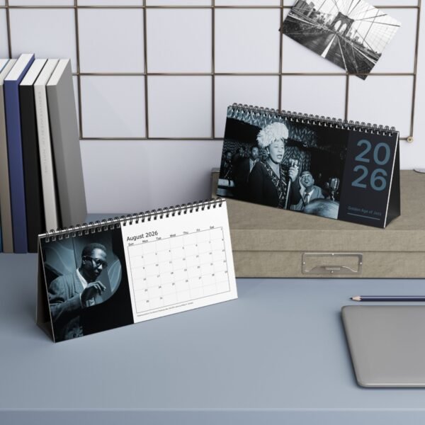 2026 jazz-themed desk calendars on office desk.