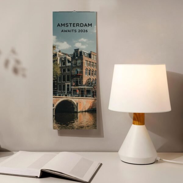 Calendar of Amsterdam 2026, lamp, and book.