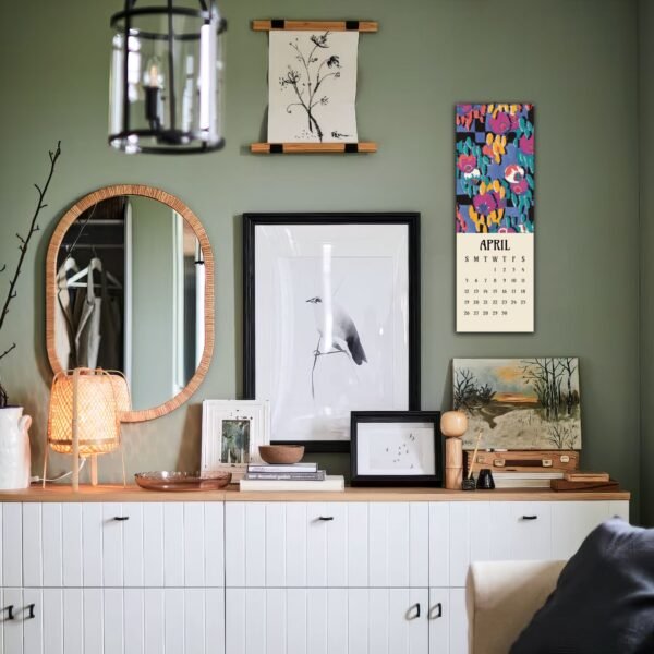 Stylish cabinet wall with decor and art pieces.