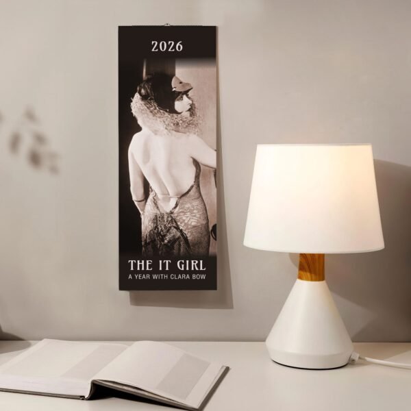 2026 calendar with vintage image and table lamp.
