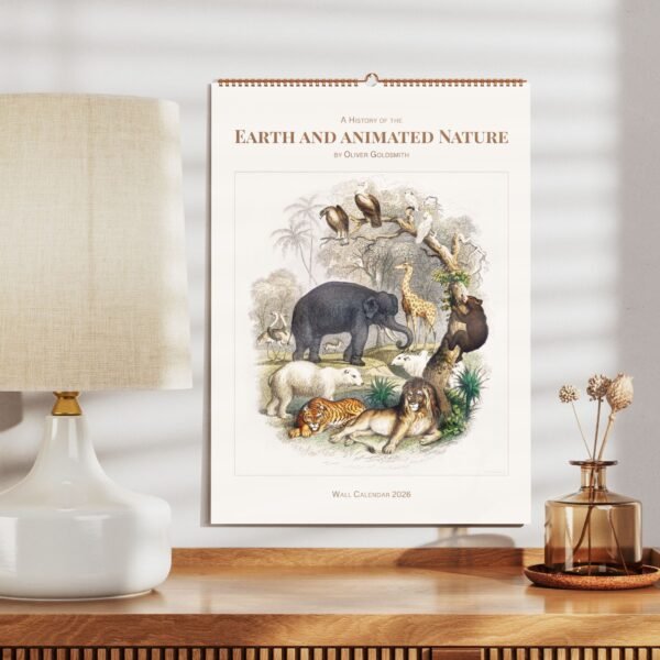 2026 animal-themed wall calendar on wooden shelf.