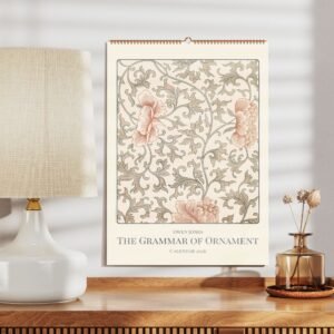 Decorative floral ornament calendar on wooden shelf.