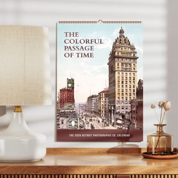 Vintage Detroit calendar with historic buildings, table decor.