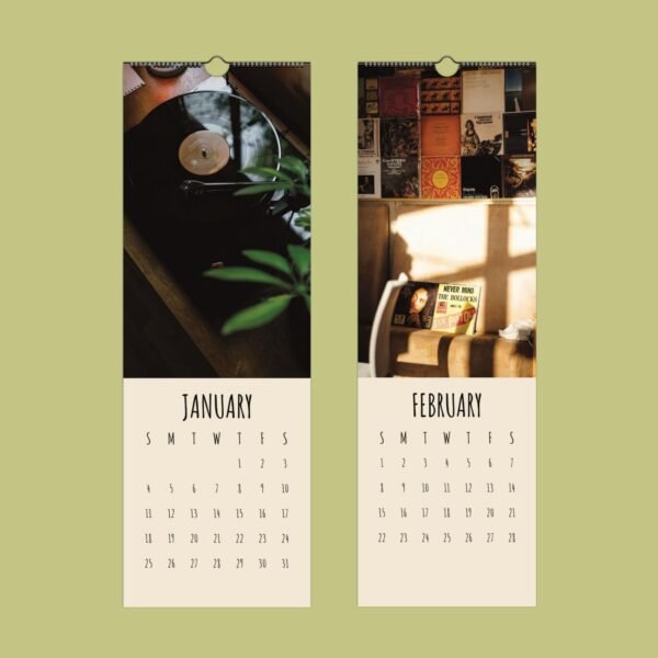 Record player and vintage wall calendar for January, February.