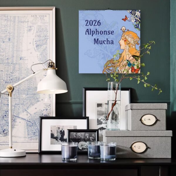2026 Alphonse Mucha calendar in stylish room.