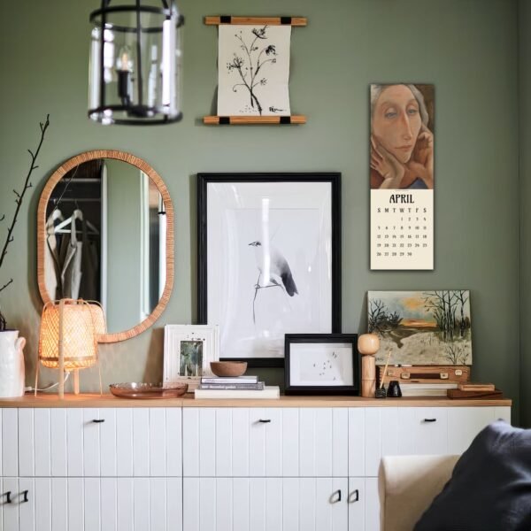 Stylish living room decor with wall art and calendar.
