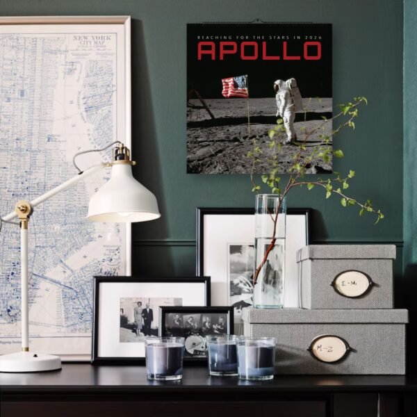 Desk with lamp, decor, and Apollo 2026 poster.