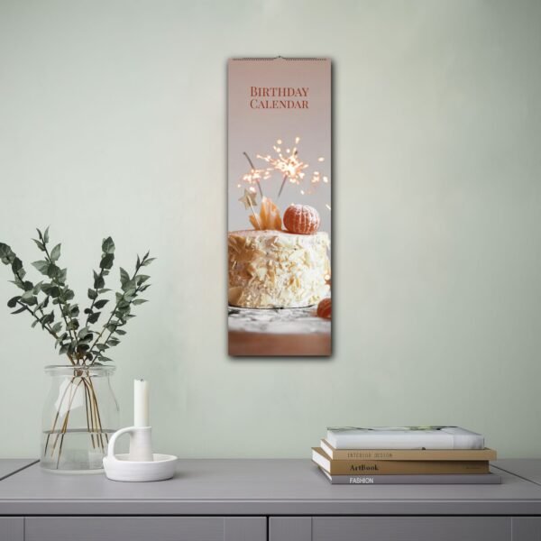Wall calendar with cake and sparklers, decorative setup.