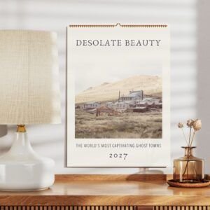 Ghost Towns 2027 Calendar on Wooden Desk